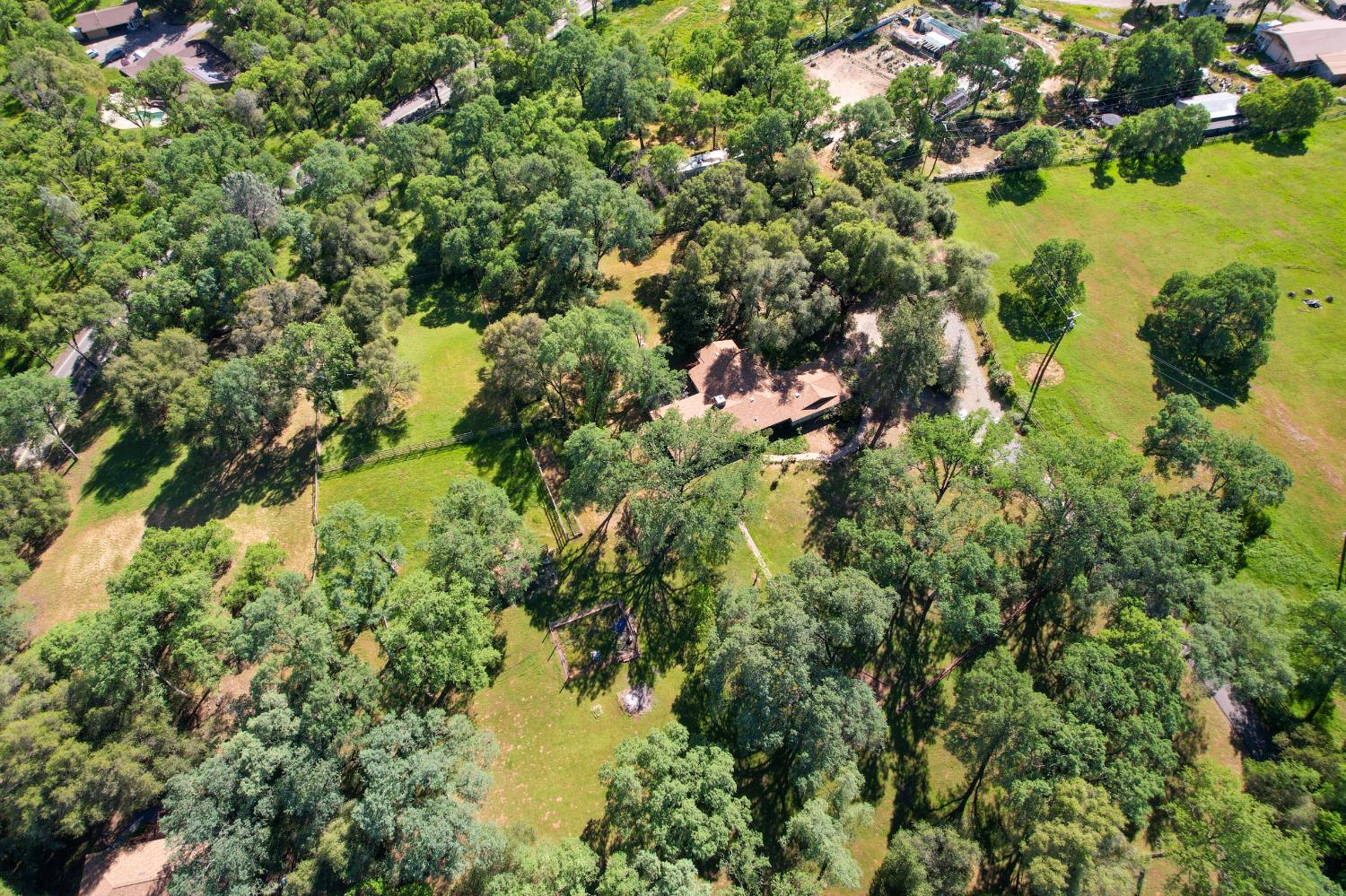 3840 Greenstone Road Placerville, CA 95667 - Photo 41 of 49 a view of a lake with a tree
