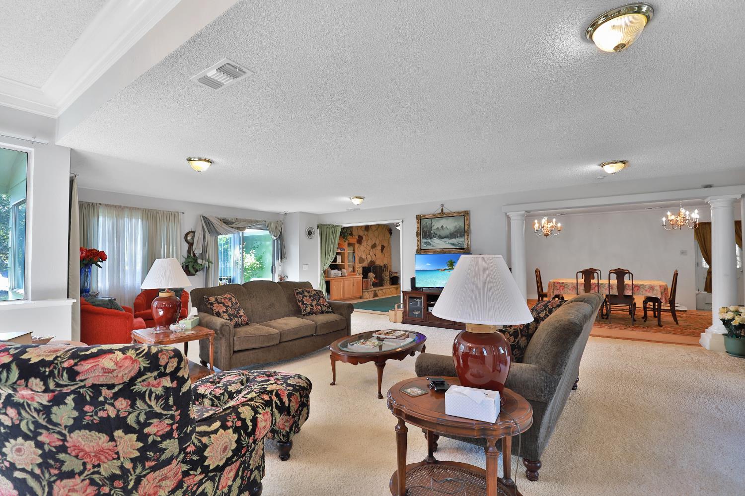 3840 Greenstone Road Placerville, CA 95667 - Photo 6 of 49 a living room with furniture and a large window
