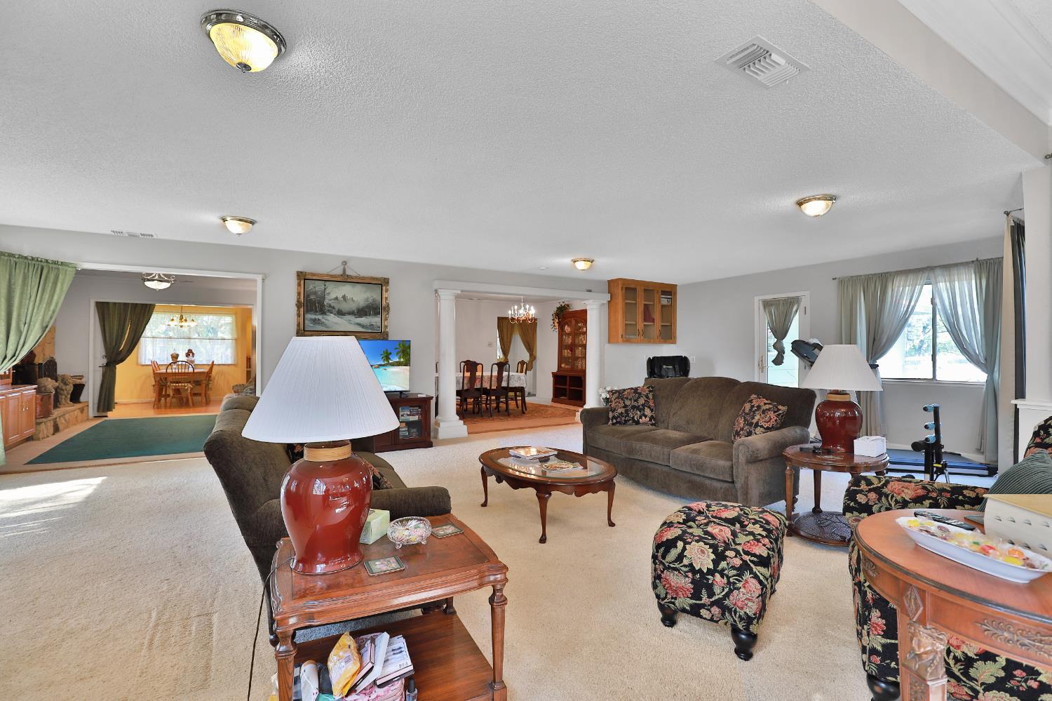 3840 Greenstone Road Placerville, CA 95667 - Photo 7 of 49 a living room with furniture and a large window