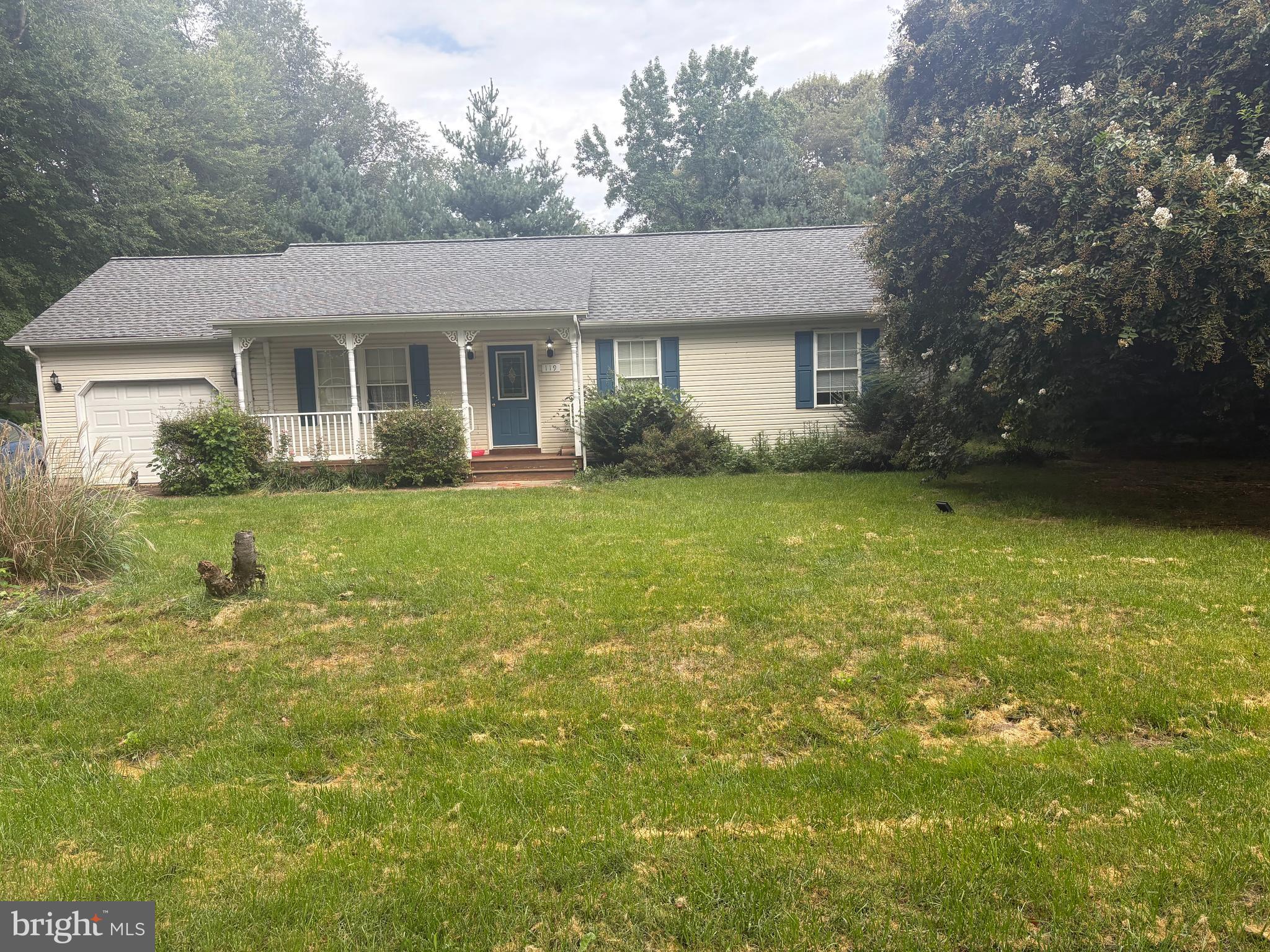 119 Darden Road Chestertown, MD 21620 - Photo 2 of 2 a front view of a house with a garden and yard