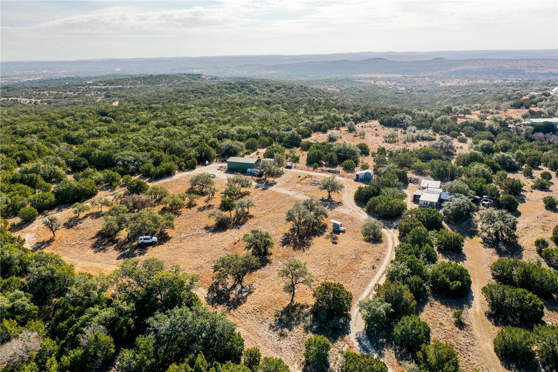 634 Ranch View Road Spicewood, TX 78669 - Photo 1 of 1 an aerial view of a houses with a yard