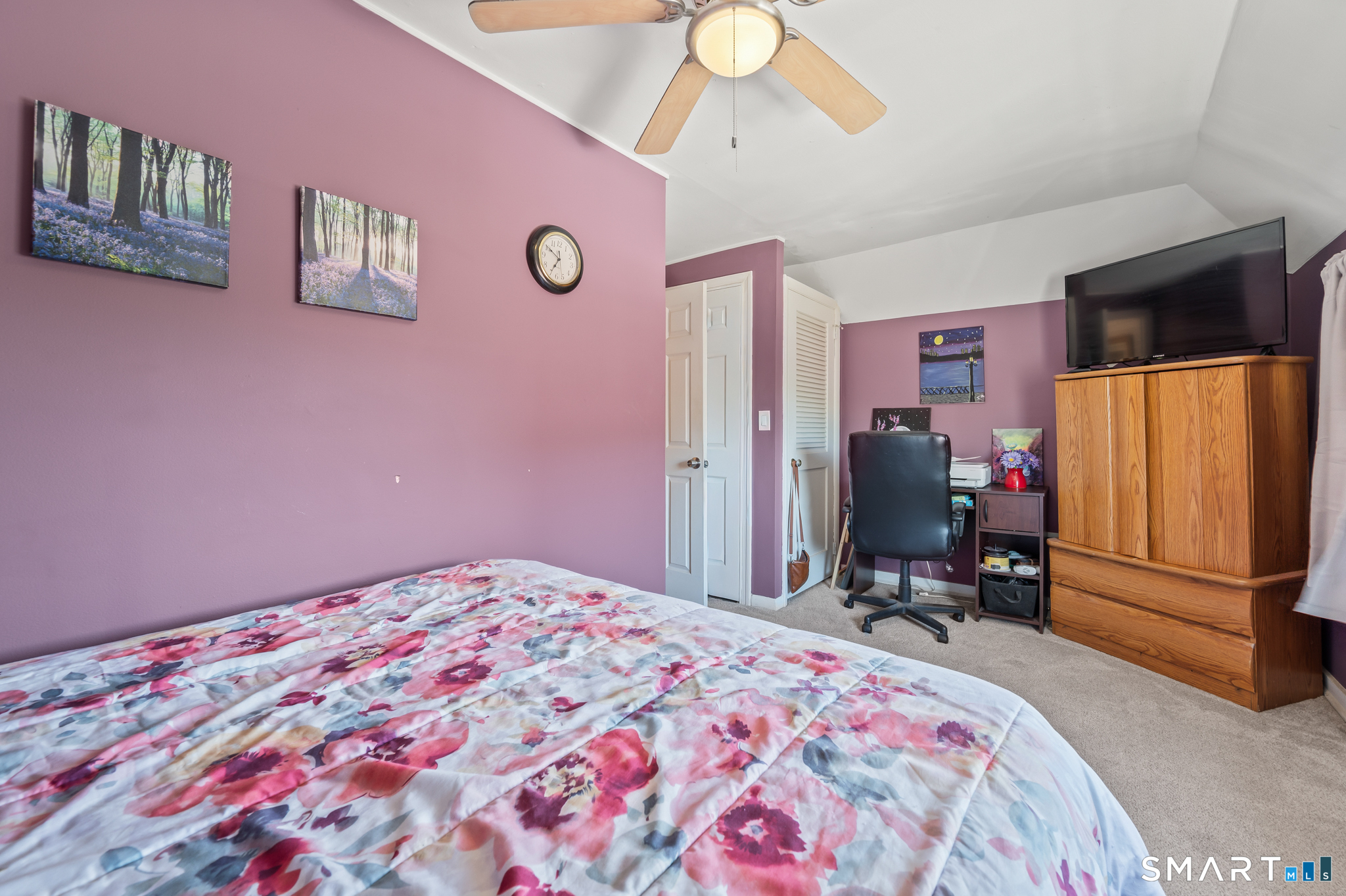 3 Flower Street Middletown, CT 06457 - Photo 10 of 17 a bedroom with a bed and a dresser in it
