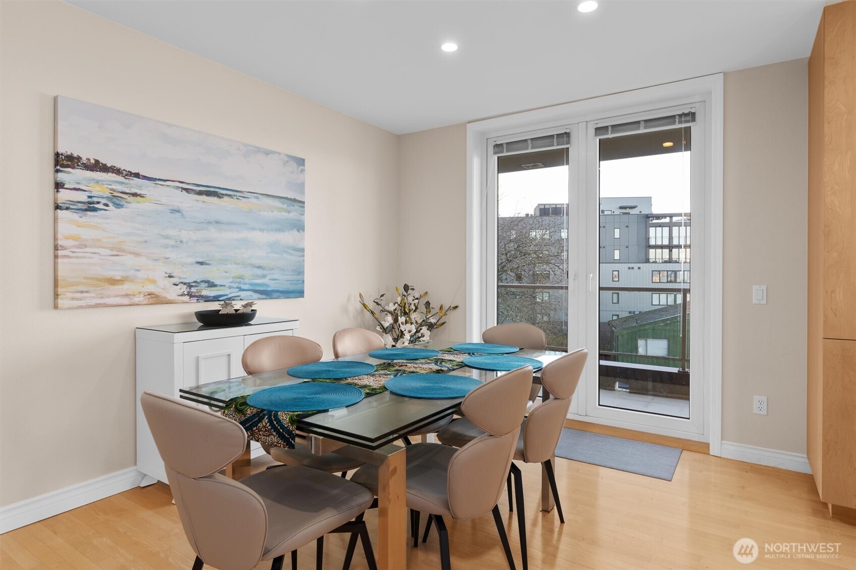1005 Harbor Avenue Southwest, Unit 400 Seattle, WA 98116 - Photo 12 of 39 a dining room with furniture and window