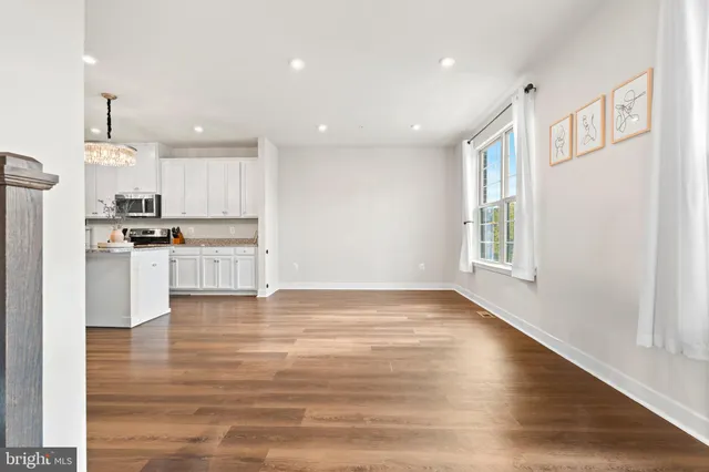 a view of kitchen with wooden floor