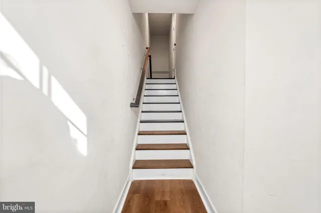 a view of entryway with wooden floor