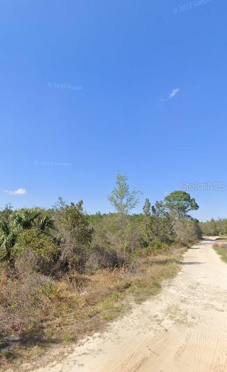 0 Steward Road Eustis, FL 32736 - Photo 2 of 12 a view of a large body of water with a mountain in the background
