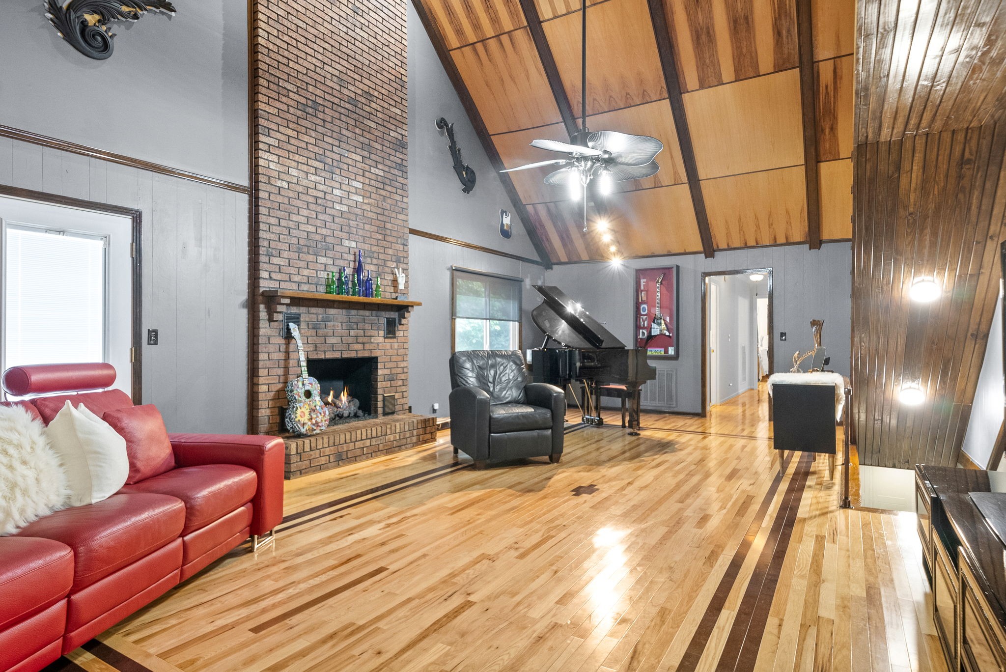 1370 Dunbar Cave Road Clarksville, TN 37043 - Photo 18 of 63 a living room with furniture and a fireplace