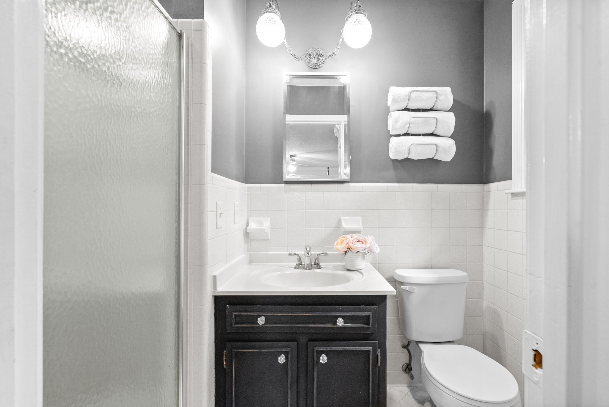 1370 Dunbar Cave Road Clarksville, TN 37043 - Photo 25 of 63 a bathroom with a sink toilet and mirror