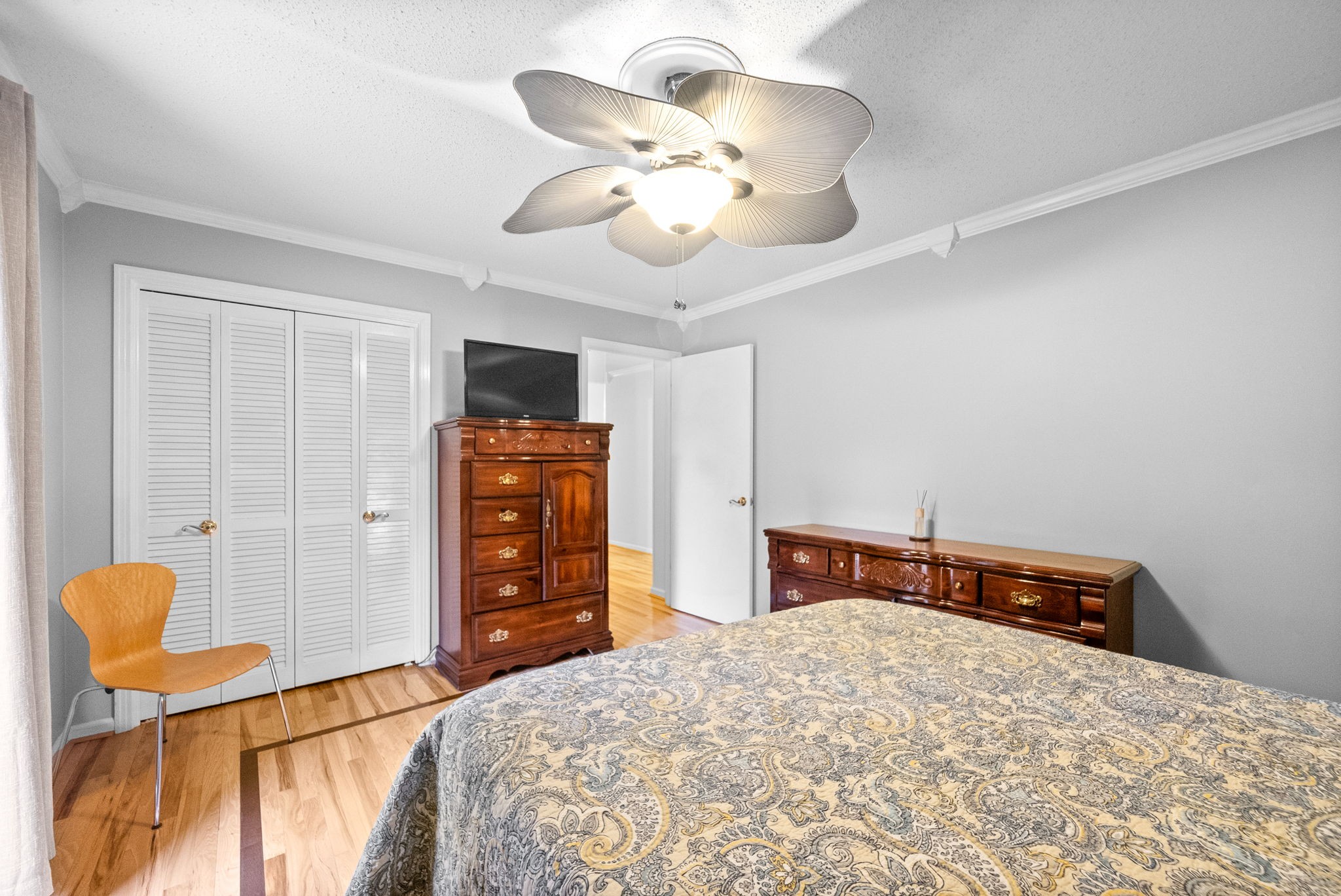 1370 Dunbar Cave Road Clarksville, TN 37043 - Photo 27 of 63 a bedroom with a bed and furniture