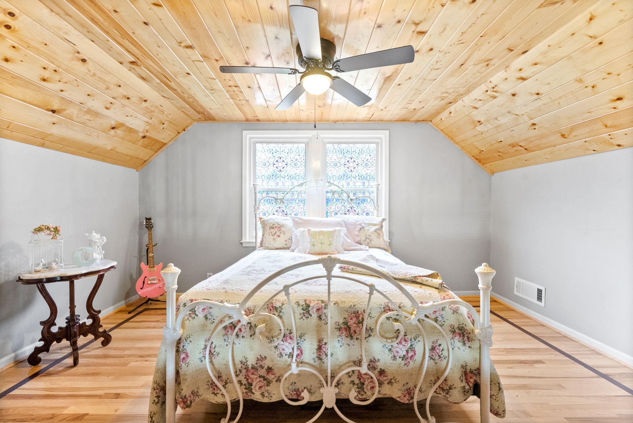 1370 Dunbar Cave Road Clarksville, TN 37043 - Photo 32 of 63 a bed sitting in a bedroom next to a window