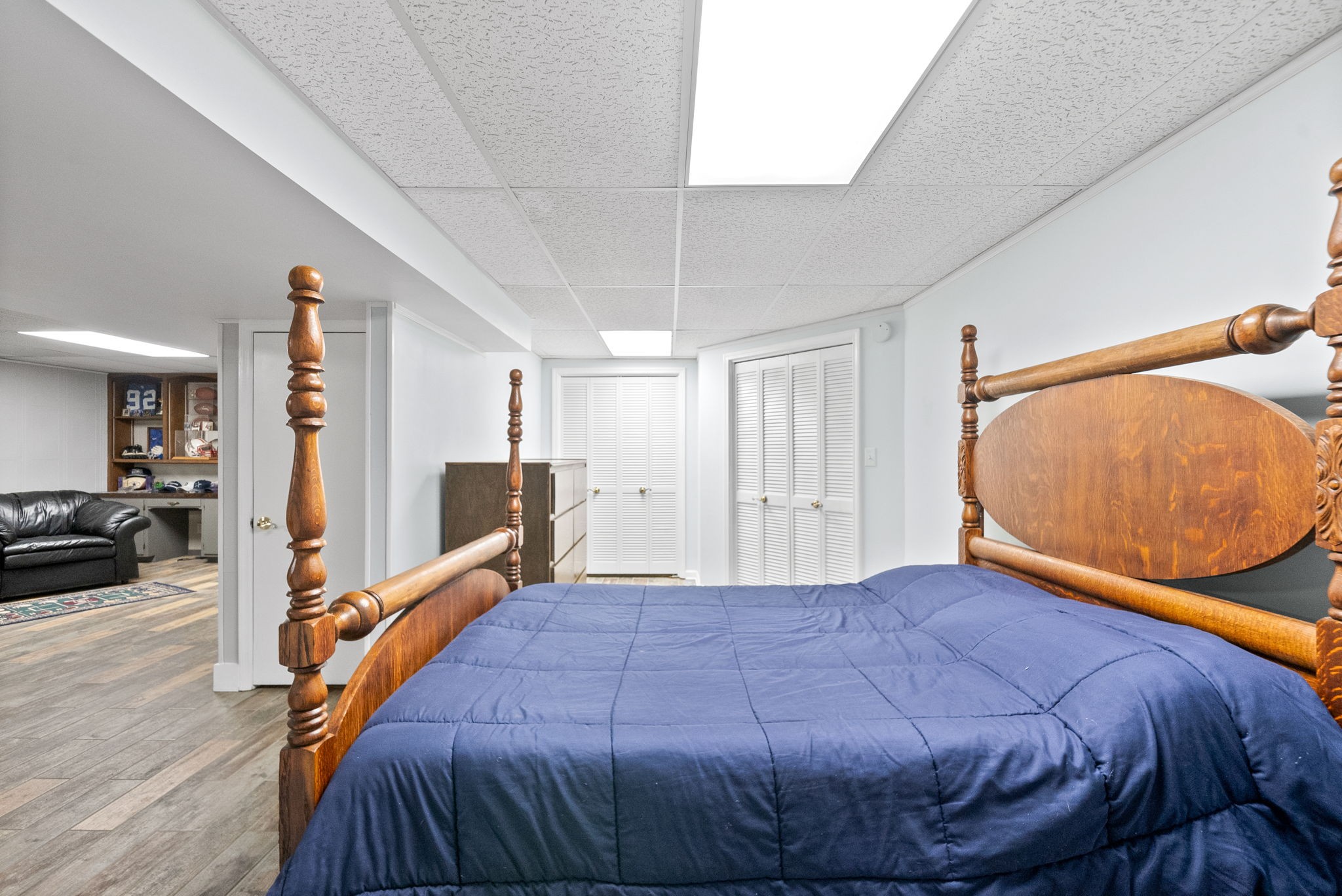1370 Dunbar Cave Road Clarksville, TN 37043 - Photo 37 of 63 a bedroom with a bed and a flat screen tv