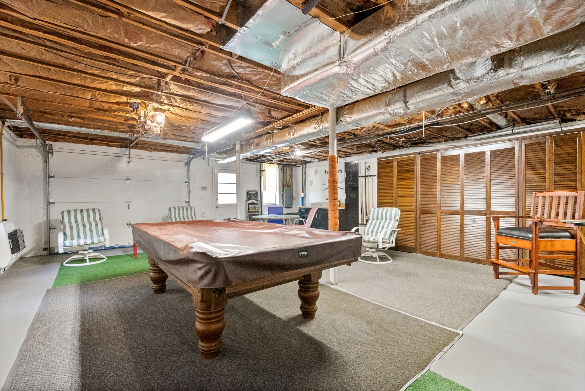 1370 Dunbar Cave Road Clarksville, TN 37043 - Photo 38 of 63 a patio with a table and chairs