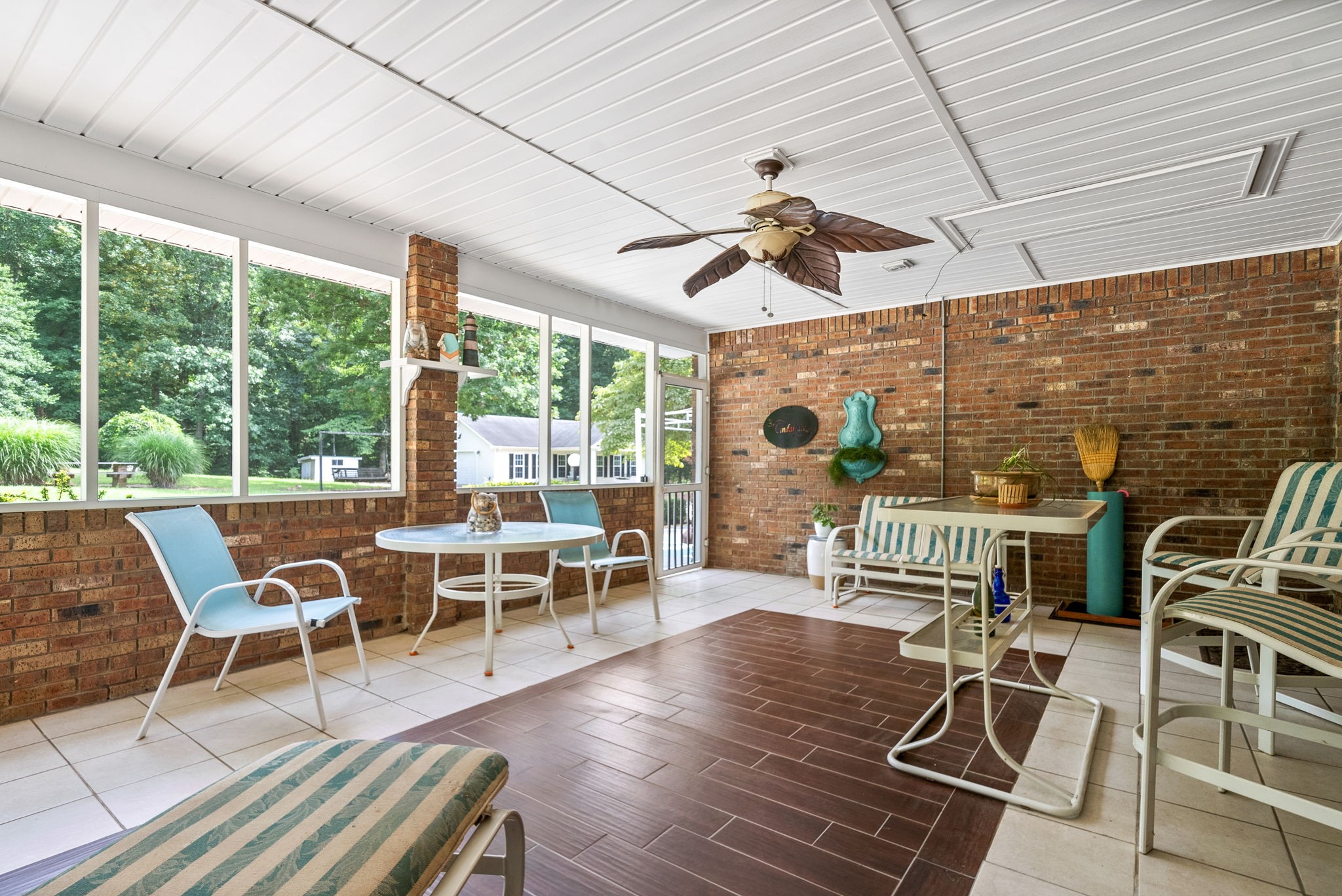 1370 Dunbar Cave Road Clarksville, TN 37043 - Photo 40 of 63 a view of a dining room with furniture wooden floor and chandelier