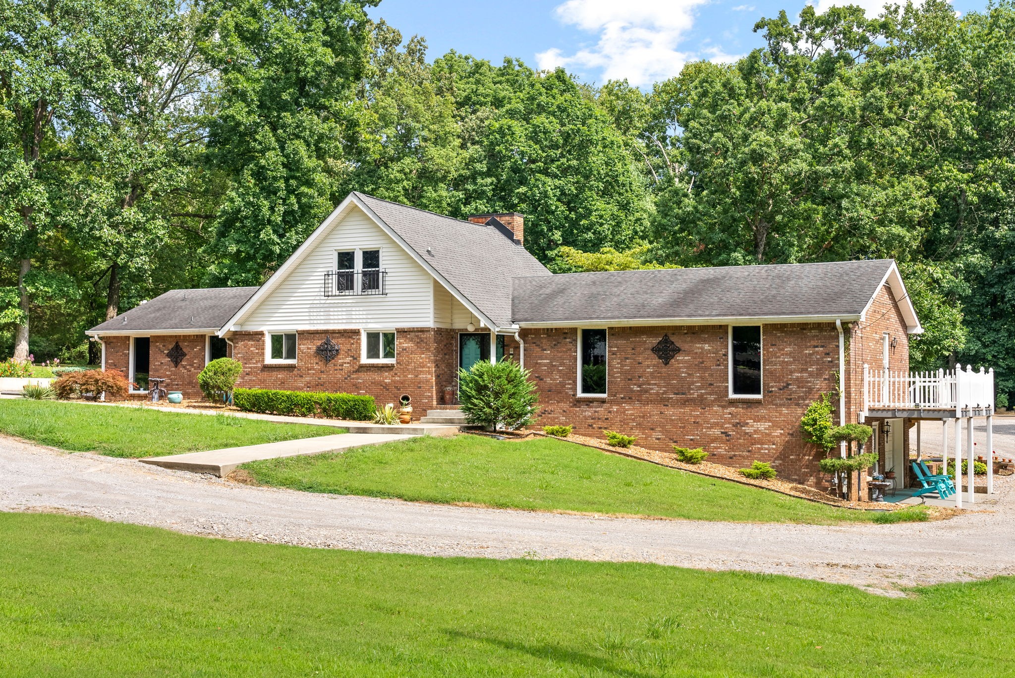 1370 Dunbar Cave Road Clarksville, TN 37043 - Photo 5 of 63 a front view of a house with a yard