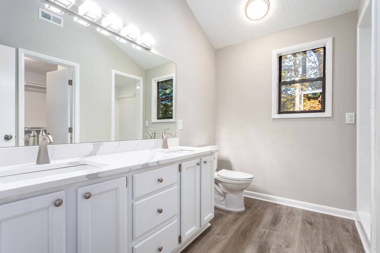 2809 Hiking Trail Raleigh, NC 27615 - Photo 20 of 28 Make sure to note the new gorgeous countertops in this spacious primary bathroom. Primary Bath/Spa