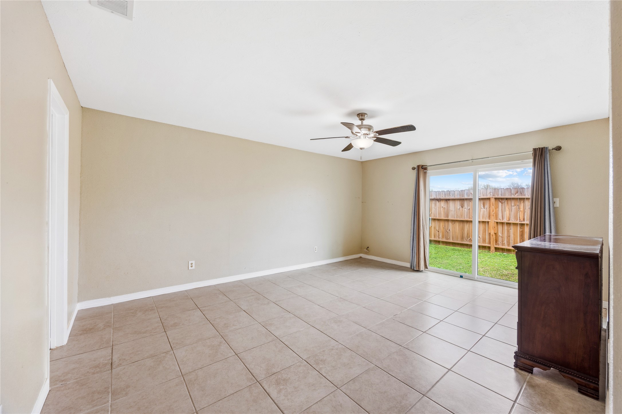9206 Homeland Drive Houston, TX 77083 - Photo 23 of 39 a view of an empty room with a window
