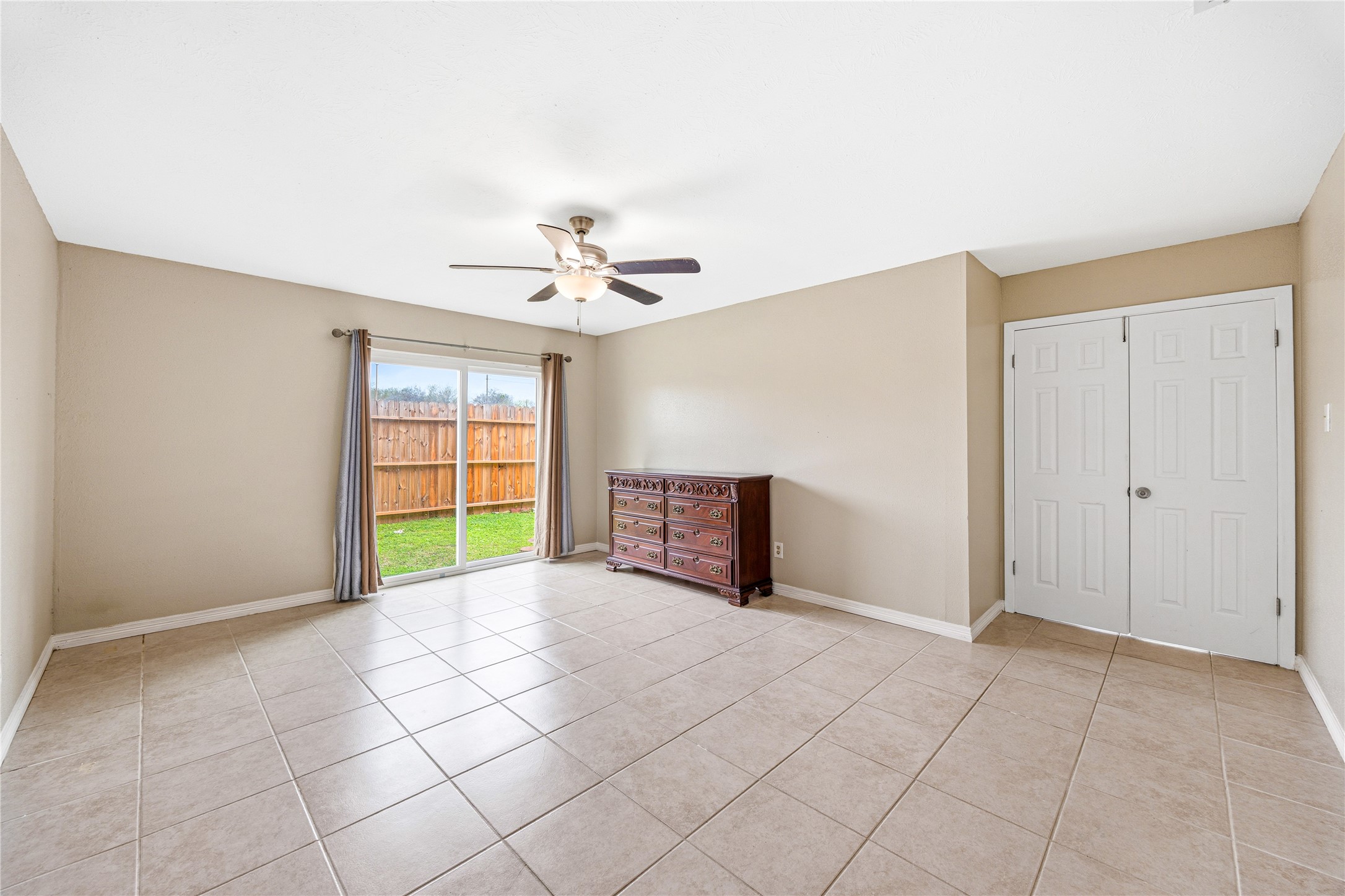 9206 Homeland Drive Houston, TX 77083 - Photo 25 of 39 Primary bedroom with double doors for added charm and character.