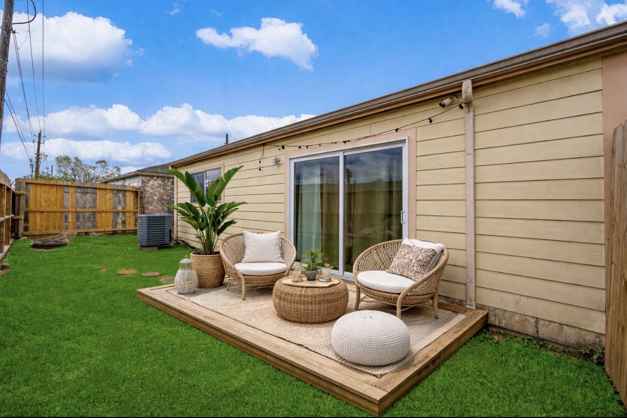 9206 Homeland Drive Houston, TX 77083 - Photo 33 of 39 a view of a patio with chair and tables