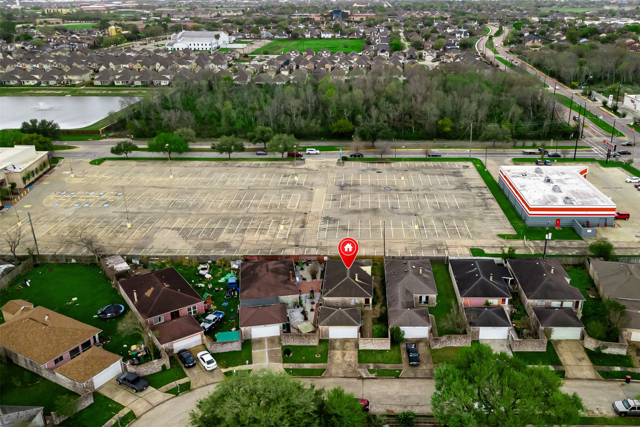 9206 Homeland Drive Houston, TX 77083 - Photo 35 of 39 an aerial view of a house with a lake view