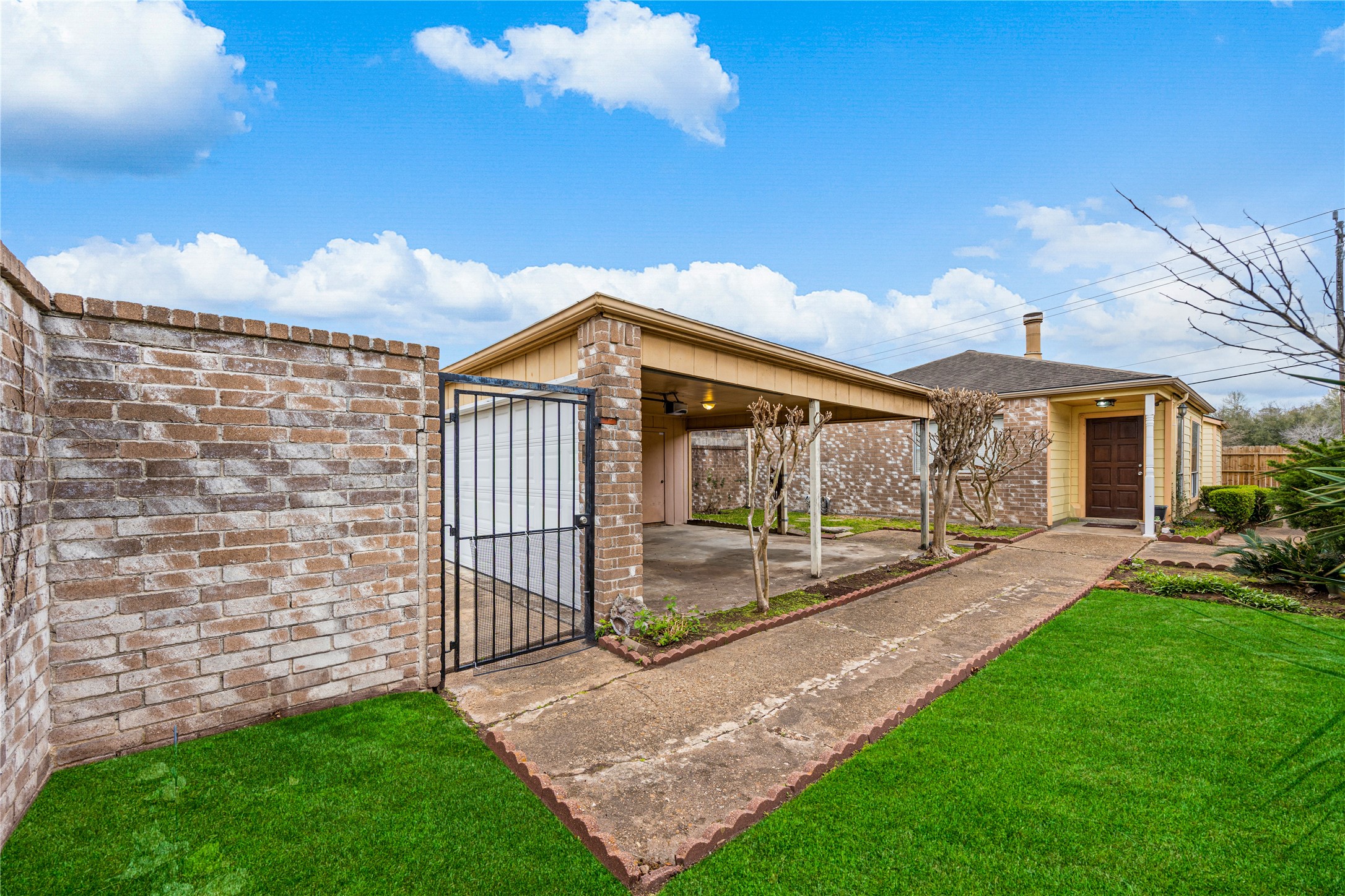 9206 Homeland Drive Houston, TX 77083 - Photo 5 of 39 a view of a house with a yard