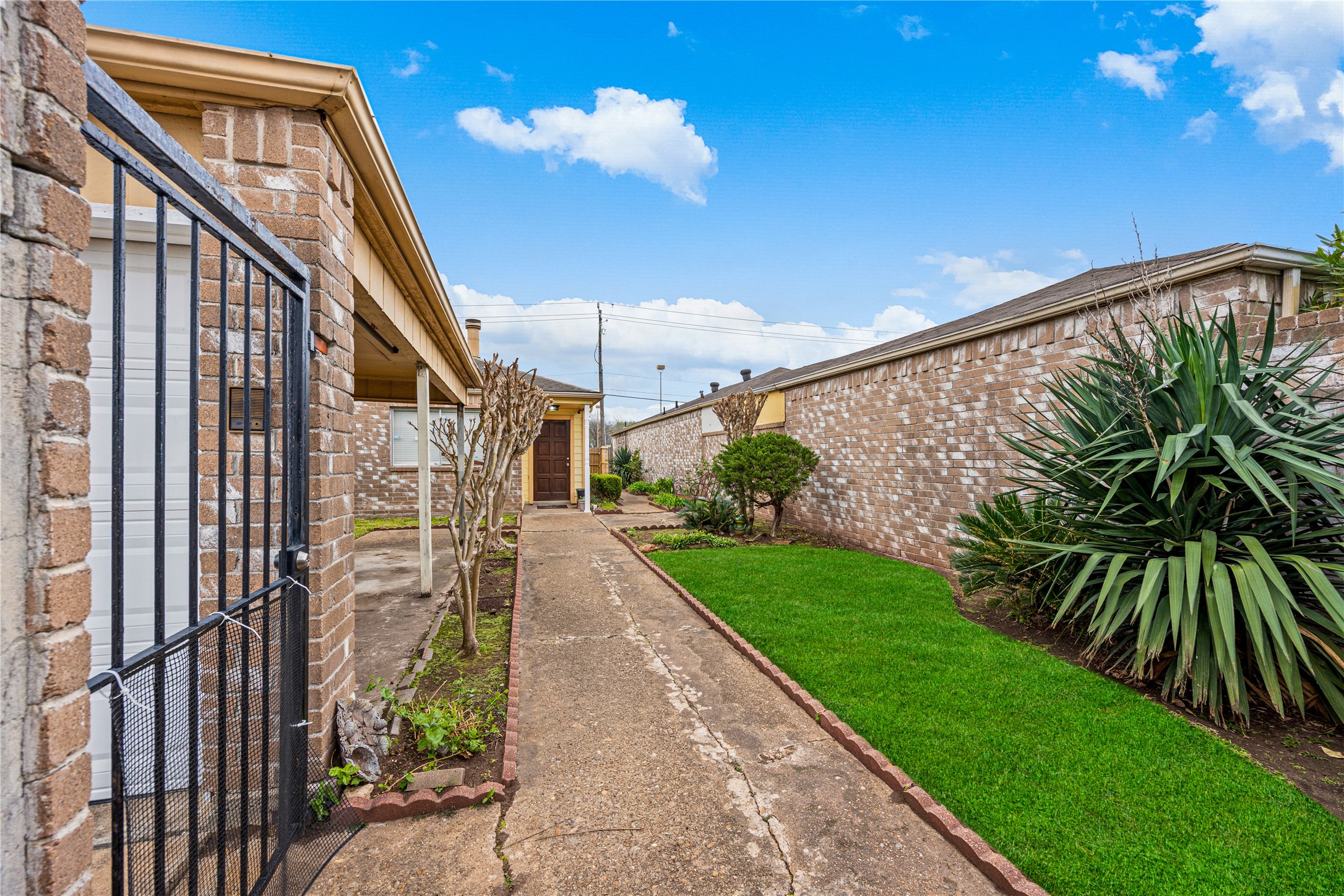 9206 Homeland Drive Houston, TX 77083 - Photo 6 of 39 a view of entryway with a front door