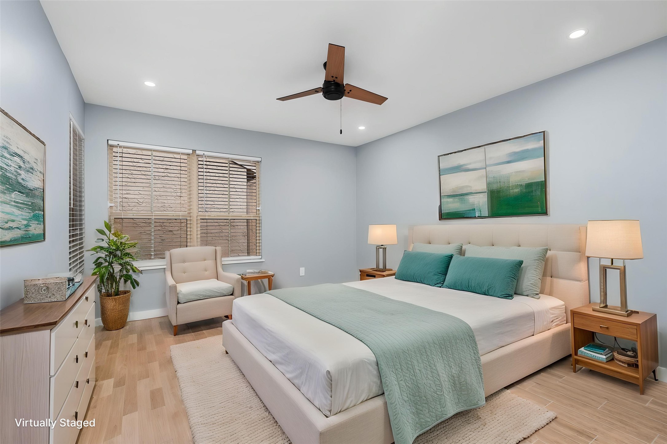 5000 Milwee Street, Unit 54 Houston, TX 77092 - Photo 10 of 25 A generous primary suite bathed in warm light with serene garden views — your personal retreat awaits. Virtually staged.