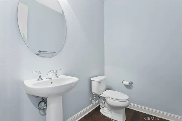 a view of living room with furniture and a flat screen tv