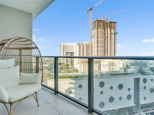 a view of a living room and window