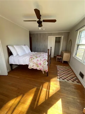 a picture of a window with white walls