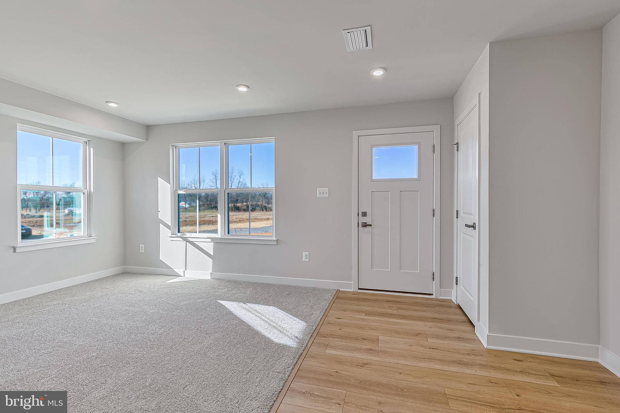 64 B Oasis Avenue Ranson, WV 25438 - Photo 4 of 40 Finished Rec Room