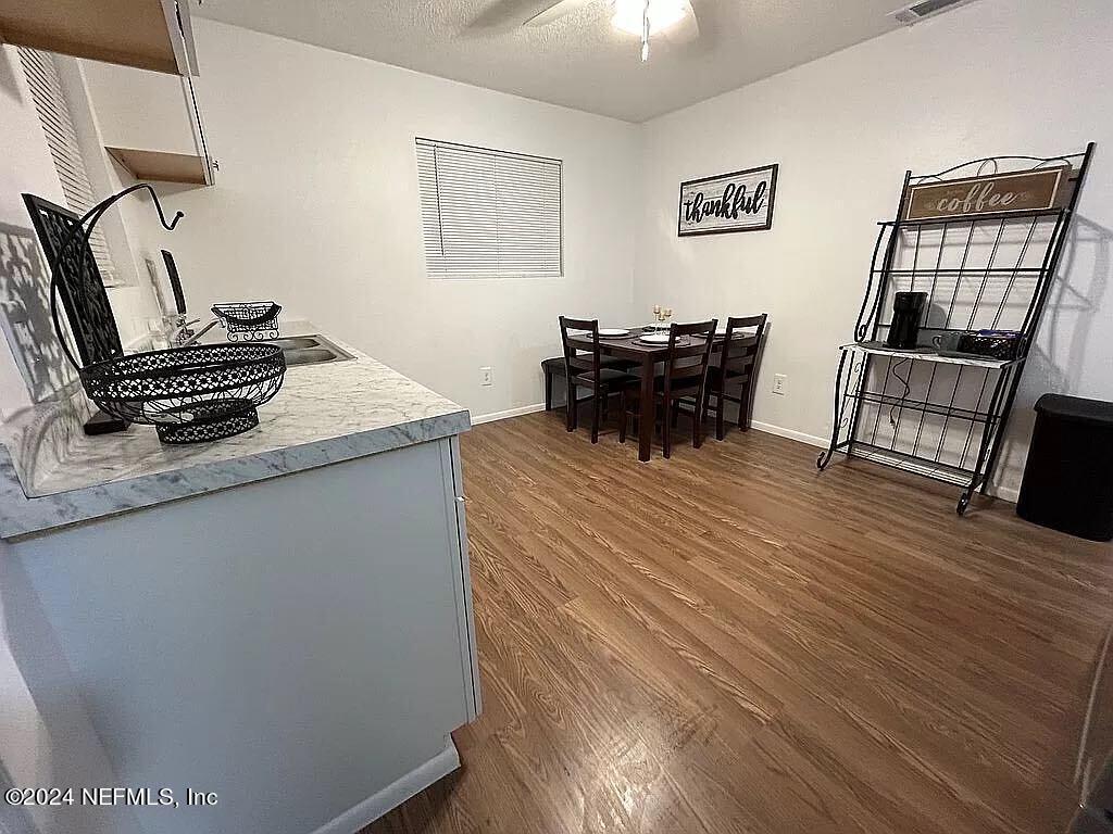 104 Dickens Street Interlachen, FL 32148 - Photo 11 of 24 a kitchen with sink and cabinets