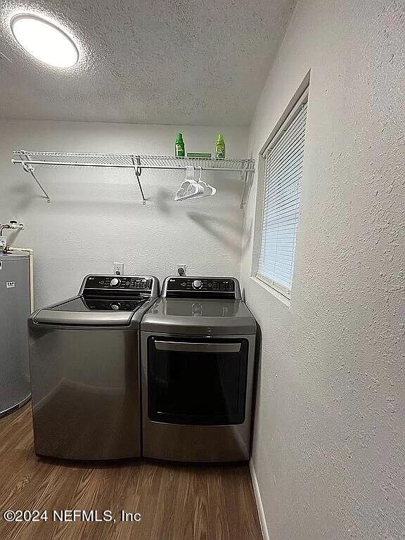 104 Dickens Street Interlachen, FL 32148 - Photo 14 of 24 a stove top oven sitting inside of a kitchen