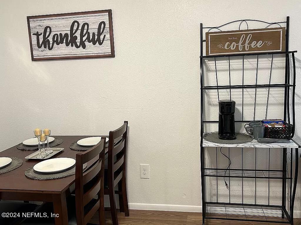 104 Dickens Street Interlachen, FL 32148 - Photo 15 of 24 a view of a table and chairs in the kitchen