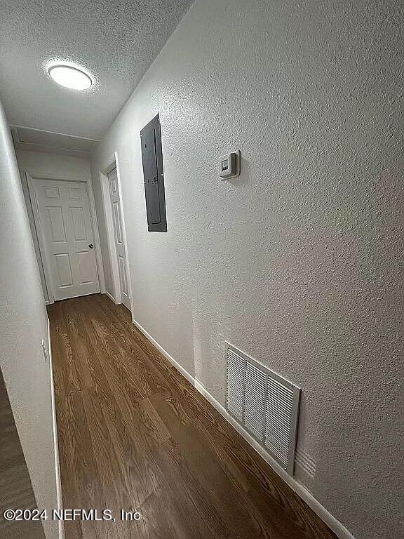 104 Dickens Street Interlachen, FL 32148 - Photo 17 of 24 a view of hallway with wooden floor