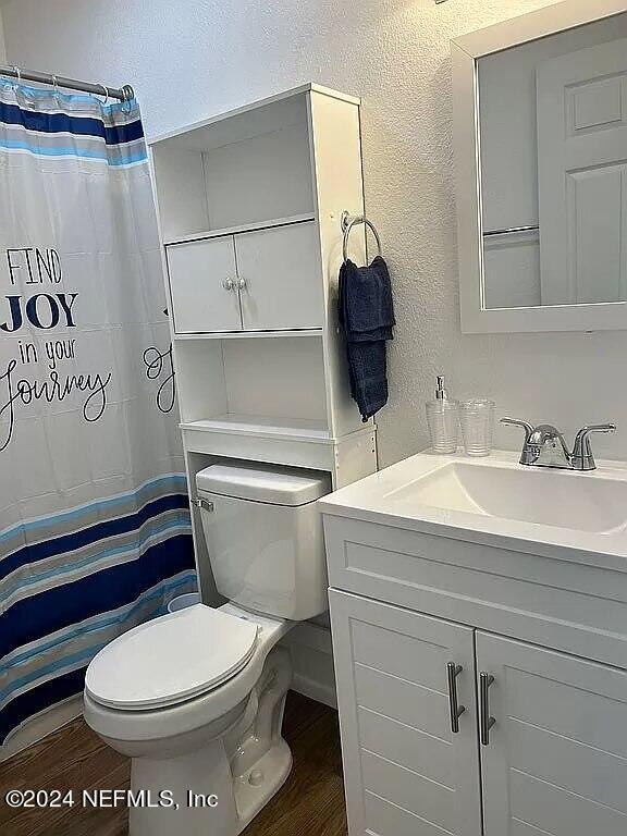 104 Dickens Street Interlachen, FL 32148 - Photo 23 of 24 a bathroom with a sink and a toilet