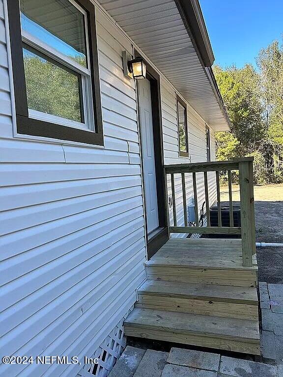 104 Dickens Street Interlachen, FL 32148 - Photo 3 of 24 a view of entryway with a front door
