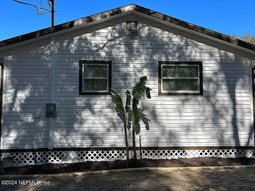 104 Dickens Street Interlachen, FL 32148 - Photo 6 of 24 a front view of a house