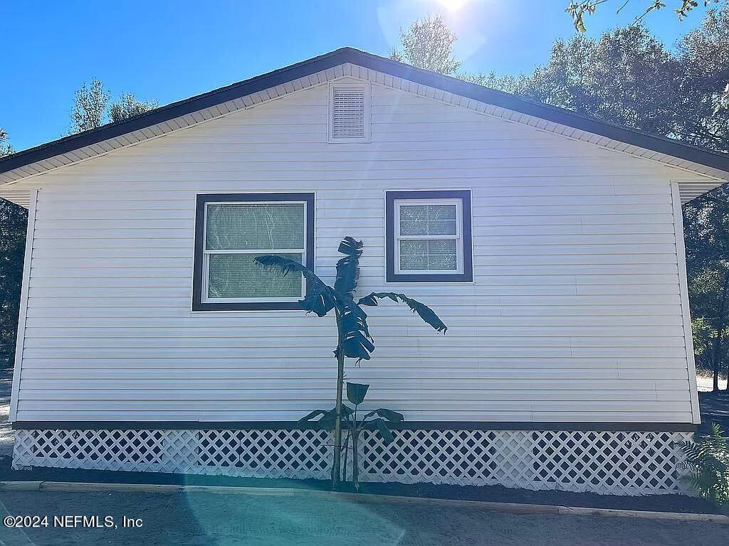 104 Dickens Street Interlachen, FL 32148 - Photo 7 of 24 a front view of a house