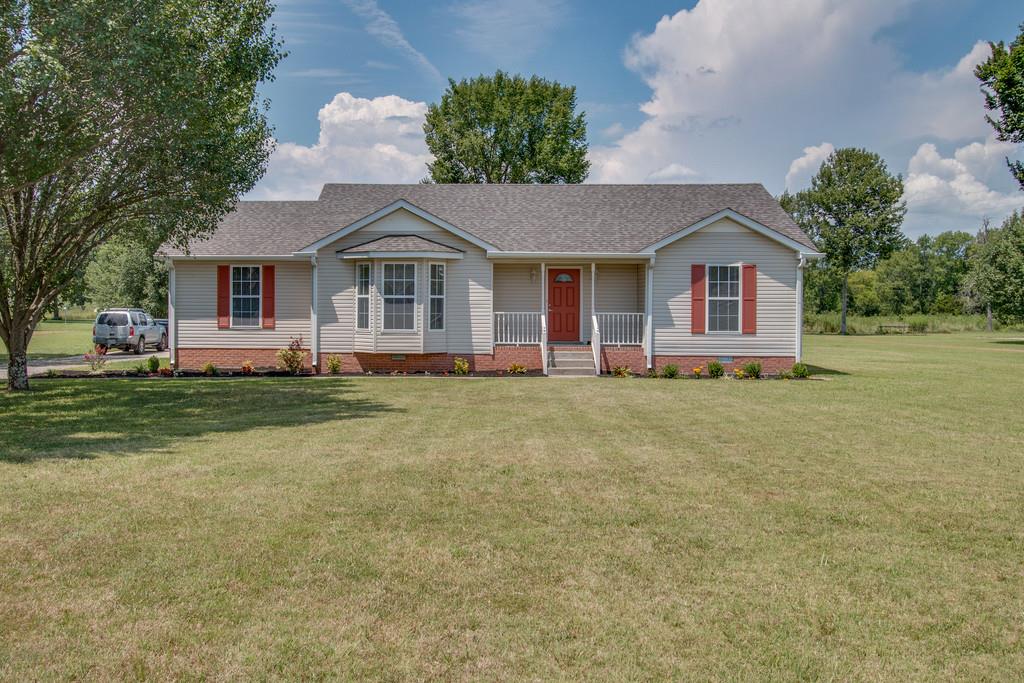296 Old Shannon Road Lebanon, TN 37090 - Photo 2 of 30 a front view of house with yard and trees in the background