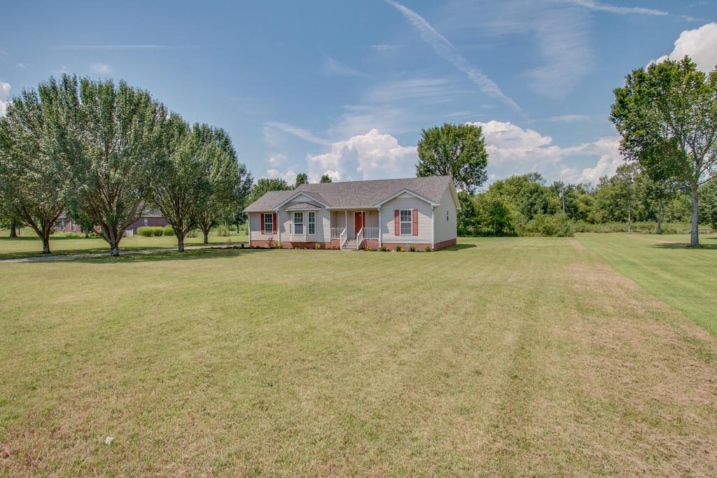 296 Old Shannon Road Lebanon, TN 37090 - Photo 3 of 30 a front view of a house with a big yard