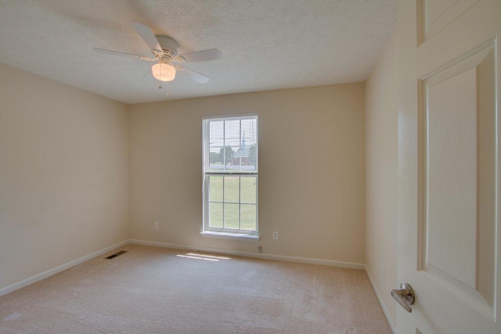 296 Old Shannon Road Lebanon, TN 37090 - Photo 22 of 30 an empty room with windows and closet