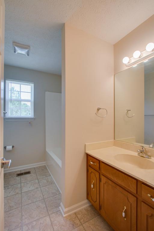 296 Old Shannon Road Lebanon, TN 37090 - Photo 24 of 30 a bathroom with a sink and a mirror