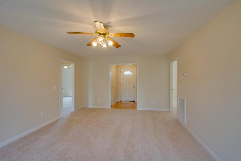 296 Old Shannon Road Lebanon, TN 37090 - Photo 9 of 30 a view of a livingroom with a ceiling fan and window