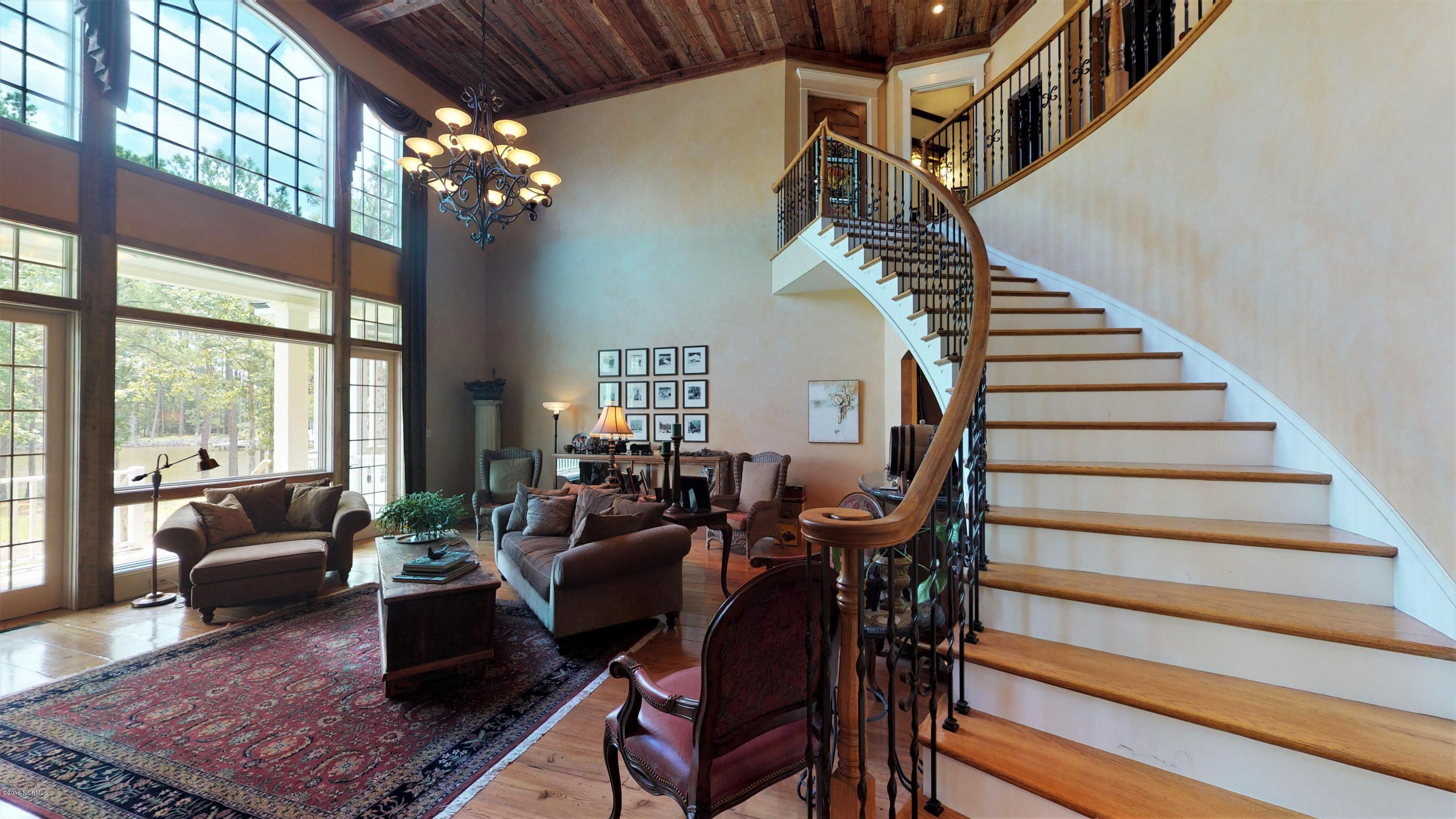 1600 Pasture Point Road Merritt, NC 28556 - Photo 42 of 116 Custom Curved Staircase