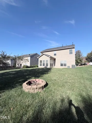 a house view with a swimming pool