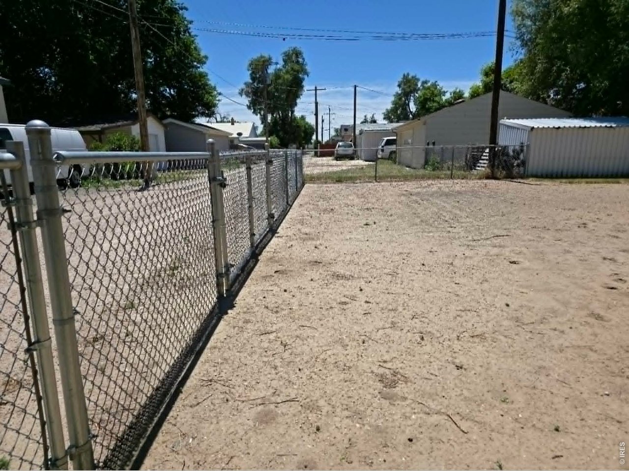 218 Maple Street Fort Morgan, CO 80701 - Photo 16 of 48 Gated back with single gate and 2 large gates for for RV, boats and more to park