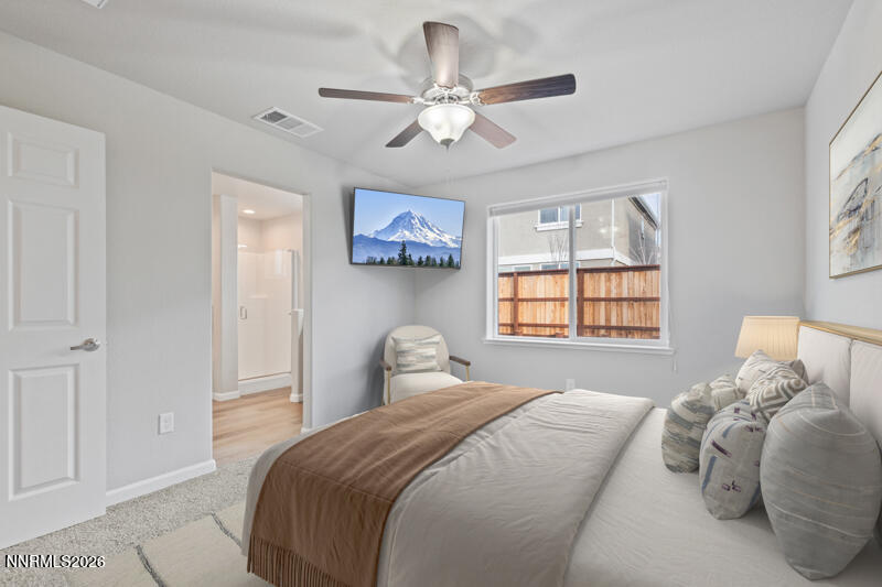 3622 Ruidoso Street Reno, NV 89512 - Photo 11 of 16 a bedroom with a bed and a window