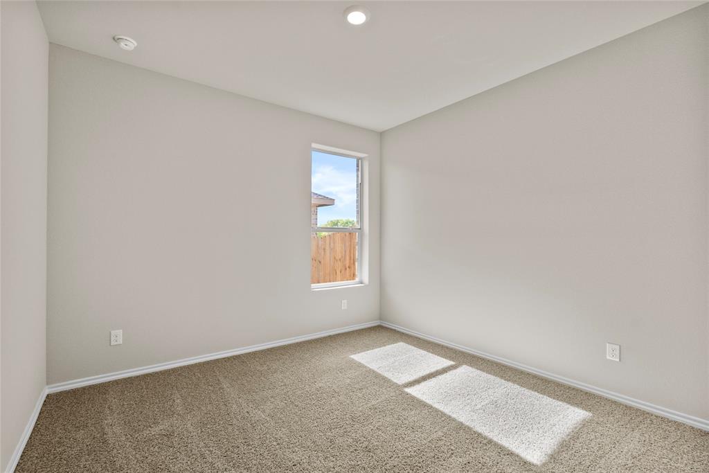 904 Traction Trail Cleburne, TX 76031 - Photo 19 of 27 an empty room with a window