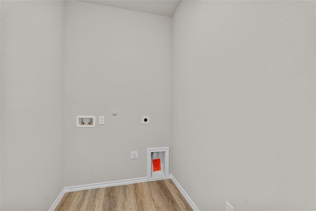 904 Traction Trail Cleburne, TX 76031 - Photo 24 of 27 a room with a hallway and a white wall