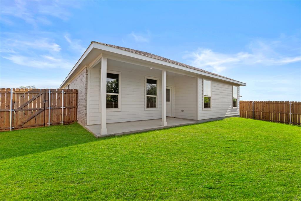 904 Traction Trail Cleburne, TX 76031 - Photo 26 of 27 a view of a backyard of the house